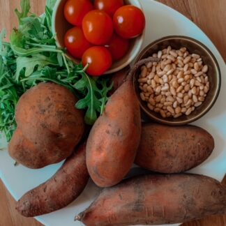 Zoete aardappelstamppot Rucola met kipdrumsticks